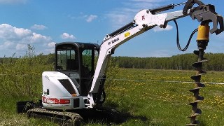 Аренда экскаватора погрузчика с ямобуром в Прохладный цена от 1565 руб